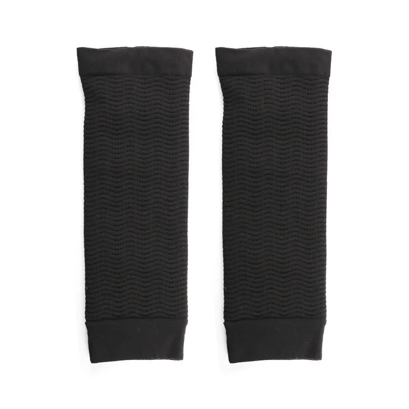 Women's shaping arm sleeves in black and skin colour options for year-round wear