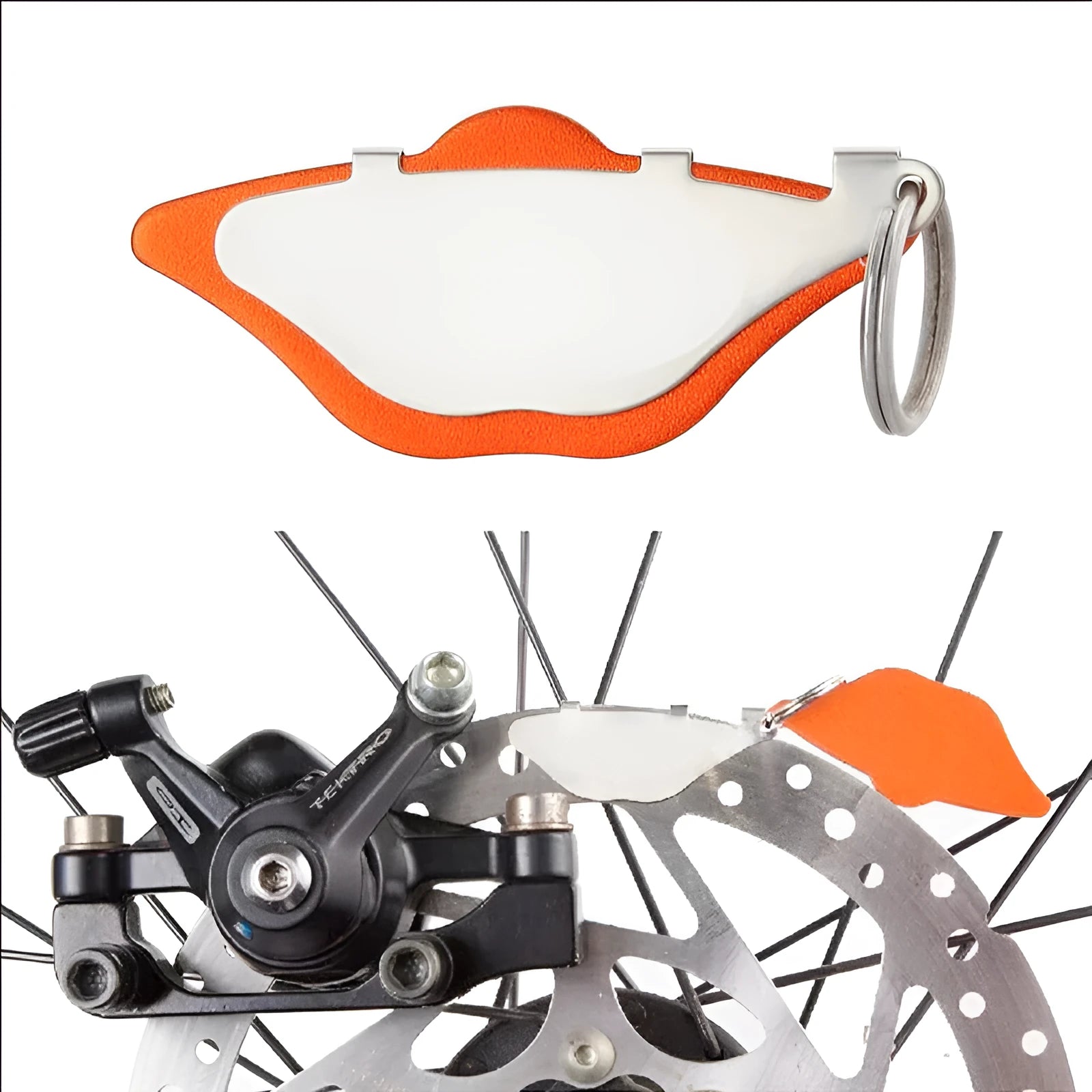 Mountain bike disc brake linings replacement pads in black and orange metal construction