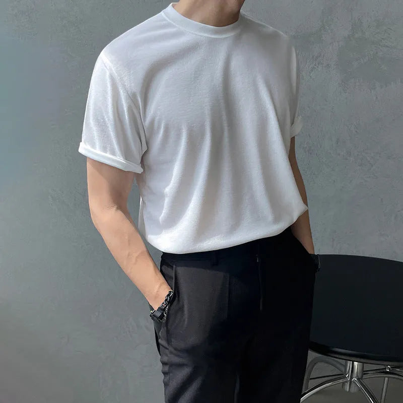 Men's slim fit plain cotton t-shirt in white on a hanger, showing round neck and half sleeve design.