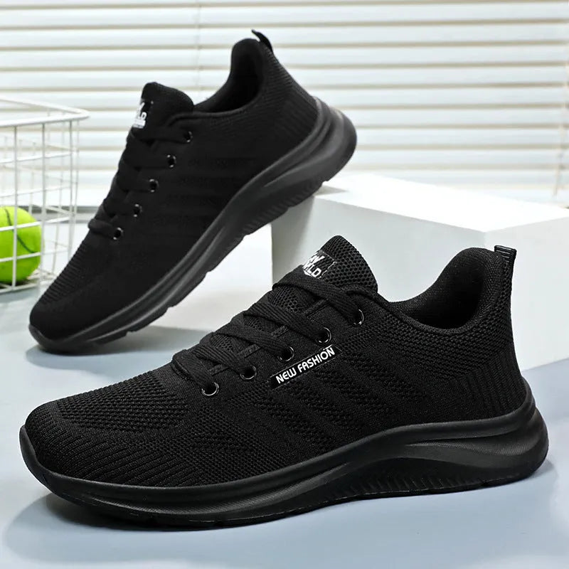 Unisex black mesh trainers in solid colour, sizes 36-44, casual shoes for men and women