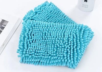 Premium chenille pet towels in various colors and sizes, designed to quickly and gently dry dogs and cats after bathing or outdoor activities.