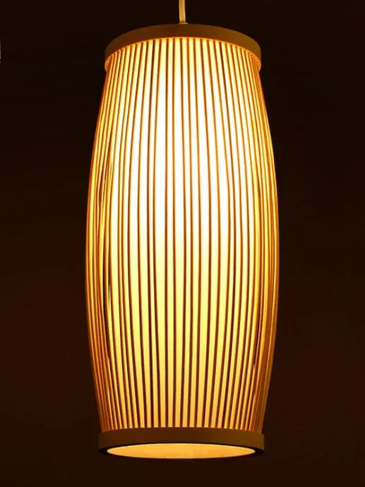 Small woven bamboo pendant lamp with E27 holder, 15cm wide by 35cm high.