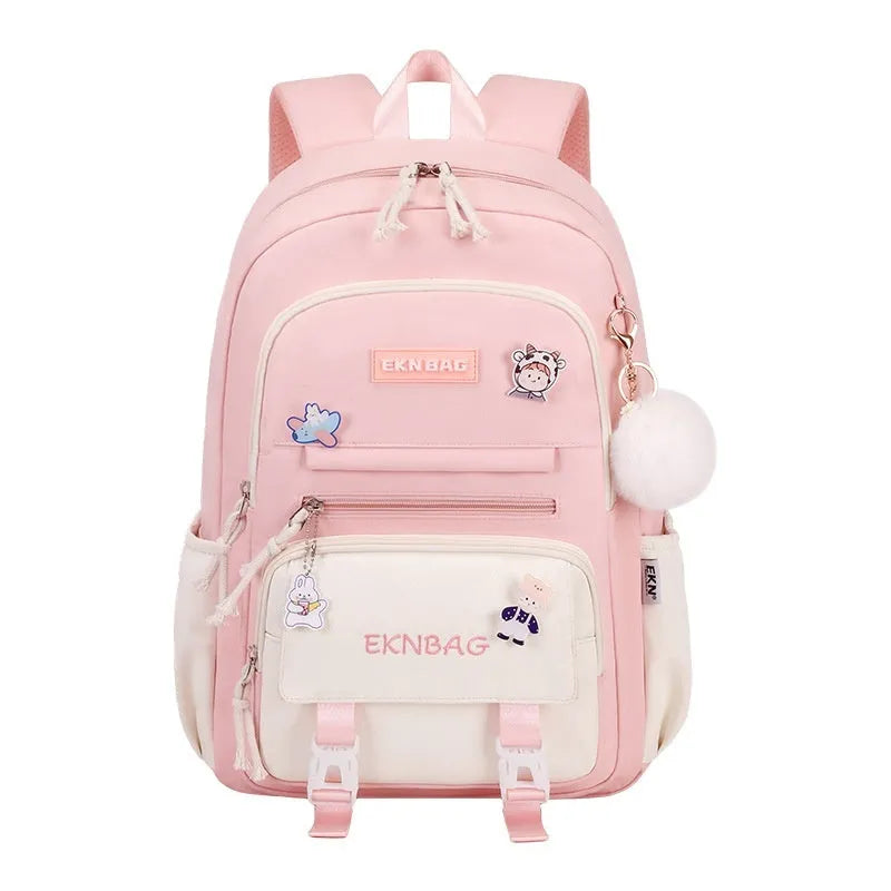 Waterproof pink school backpack for girls with curved straps and a matching pencil case.