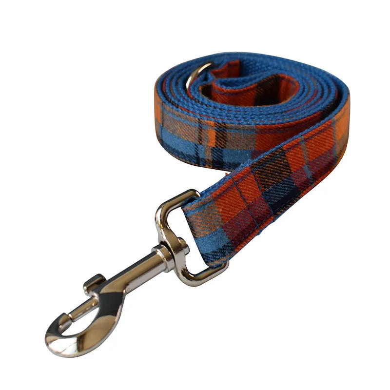 Blue plaid velvet dog collar with metal buckle and bow accessory