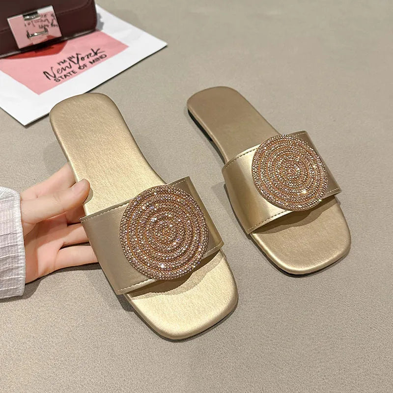 Open toe PU slippers with rhinestone trim in black colour