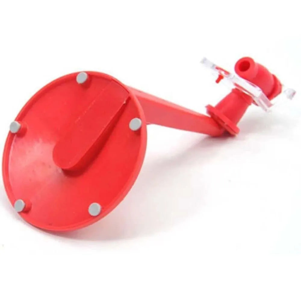 Red plastic Magic Tap soda dispenser attached to inverted 2-litre bottle for push-button drink serving