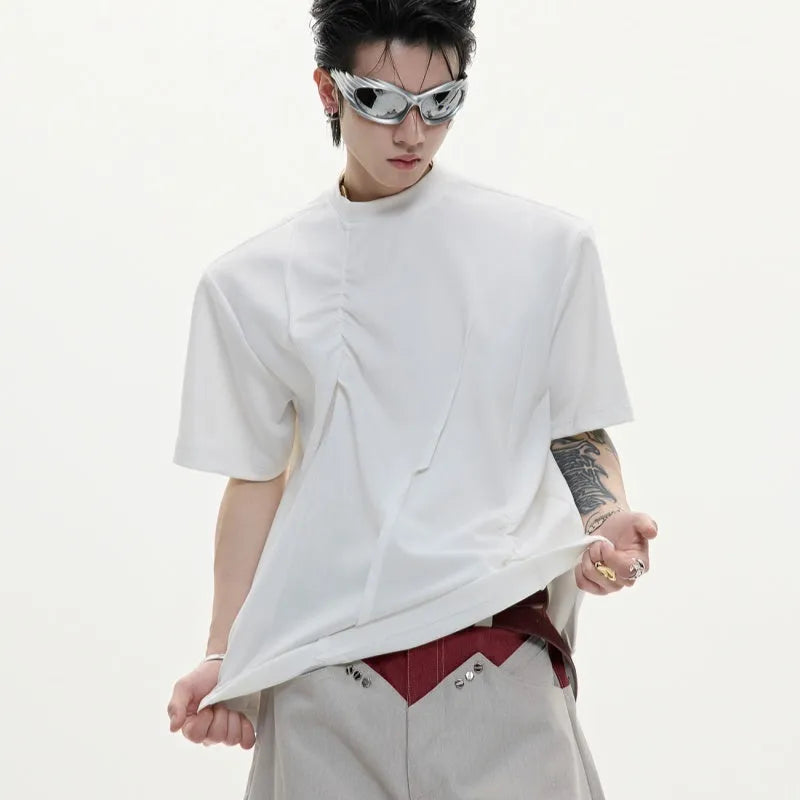 Men's loose fit cotton t-shirt with round neck collar and asymmetrical stitching in black, grey, or white