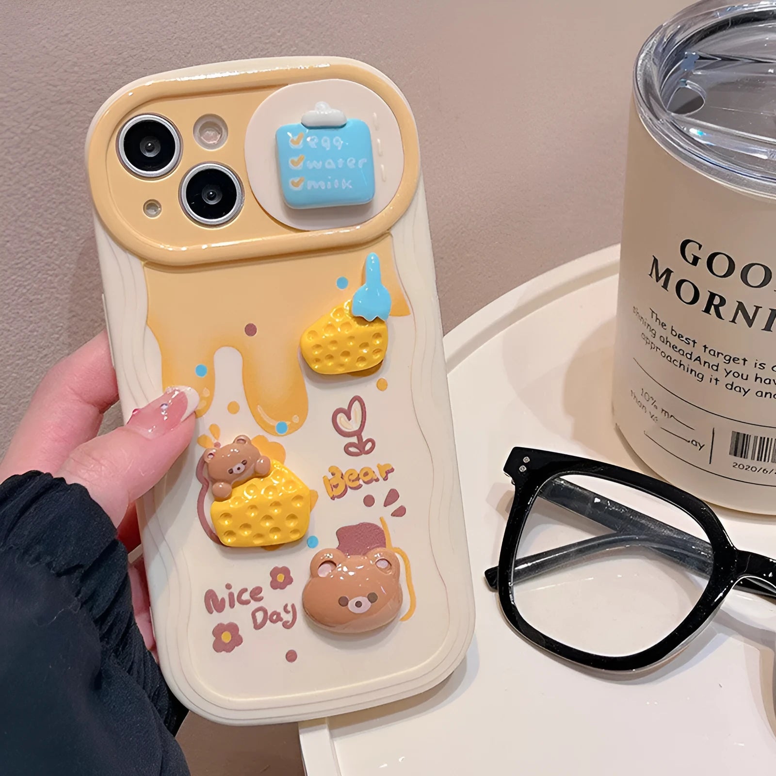 Apricot plastic phone case with Cheese Bear cartoon and sliding window for iPhone 14 Pro