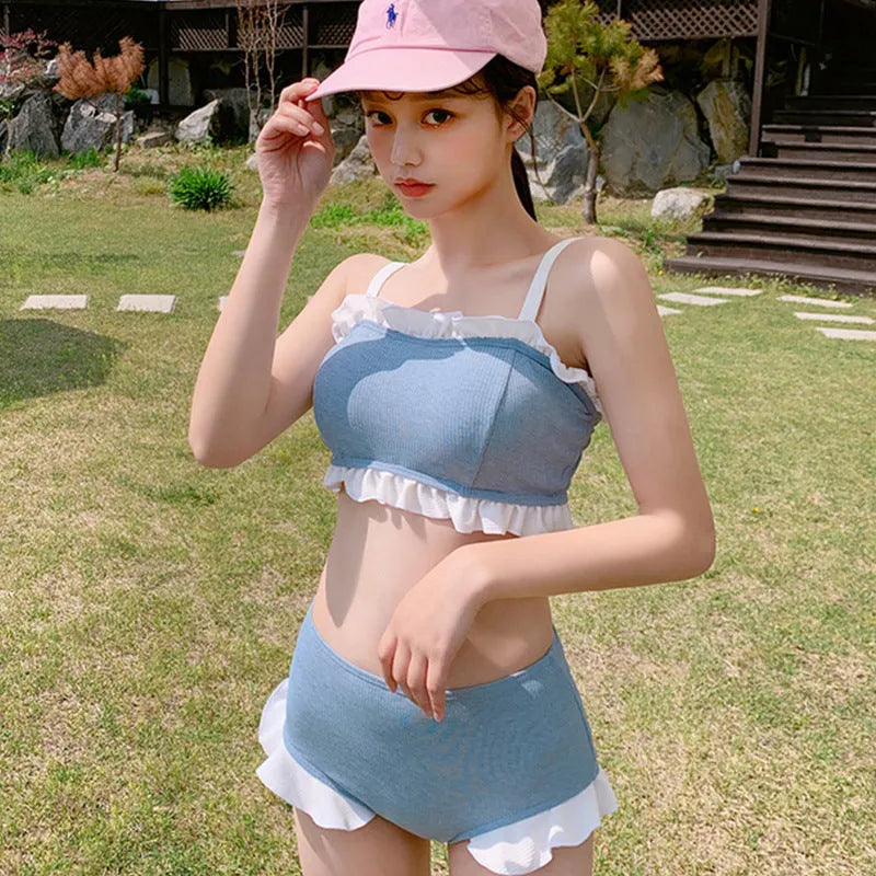 Women's solid colour one-piece swimsuit with split suspenders design in conservative cut