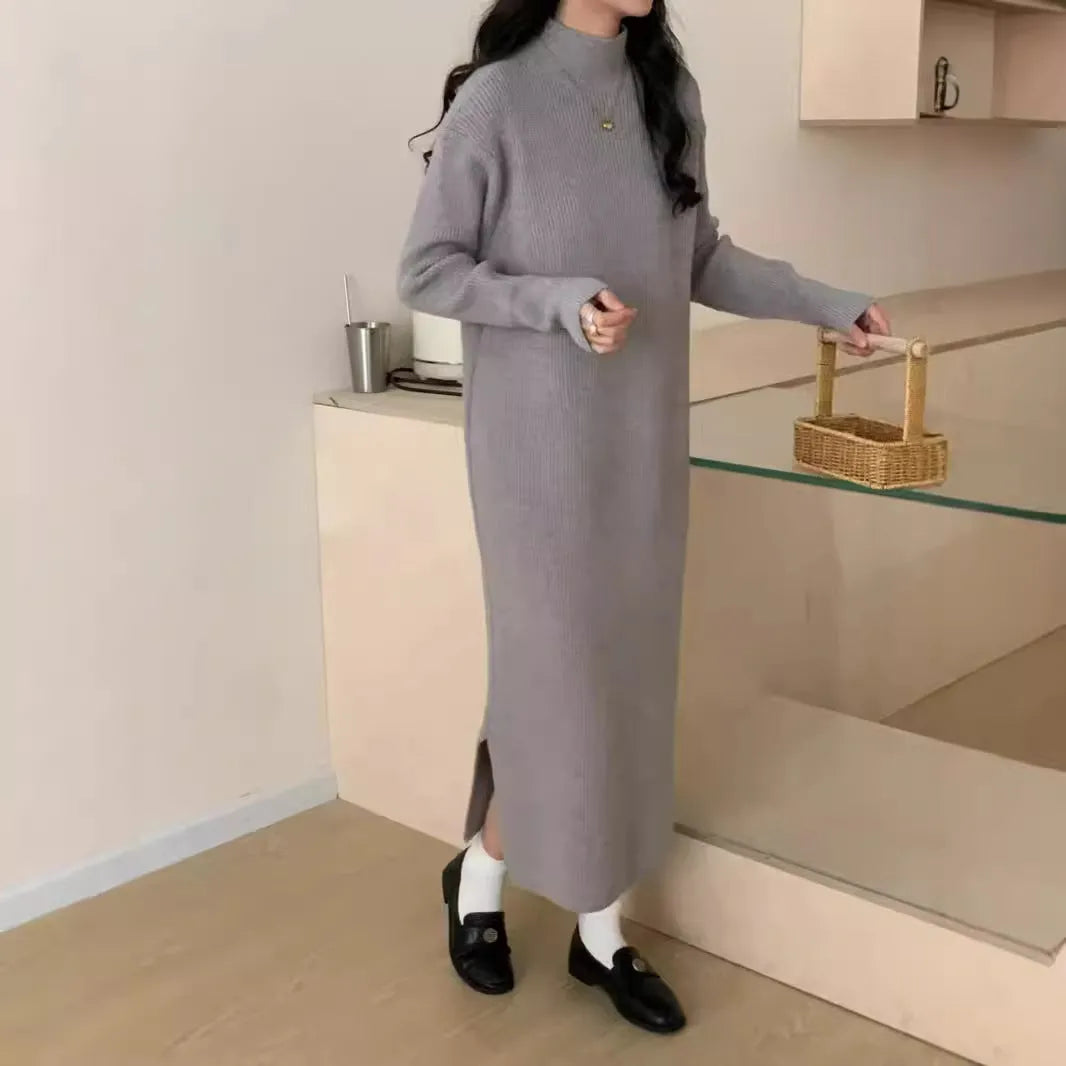 Women's acrylic knitted dress with half turtleneck, long sleeves, and midi length in solid colour