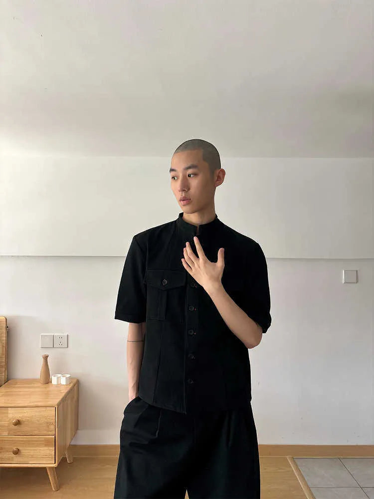 Handmade black loose fit half sleeve men's shirt with a shirt collar.