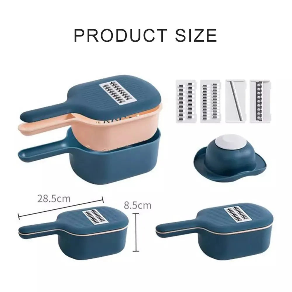 Dark blue manual vegetable cutter with four stainless steel blades, a hand protection guard, and a drain basket on a kitchen counter.