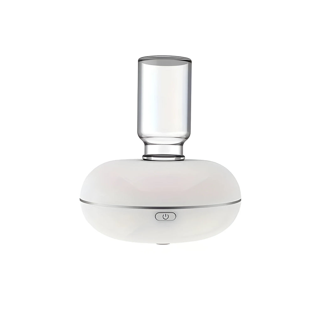 White automatic sensor fragrance machine mini USB diffuser for home bathroom use on a shelf
