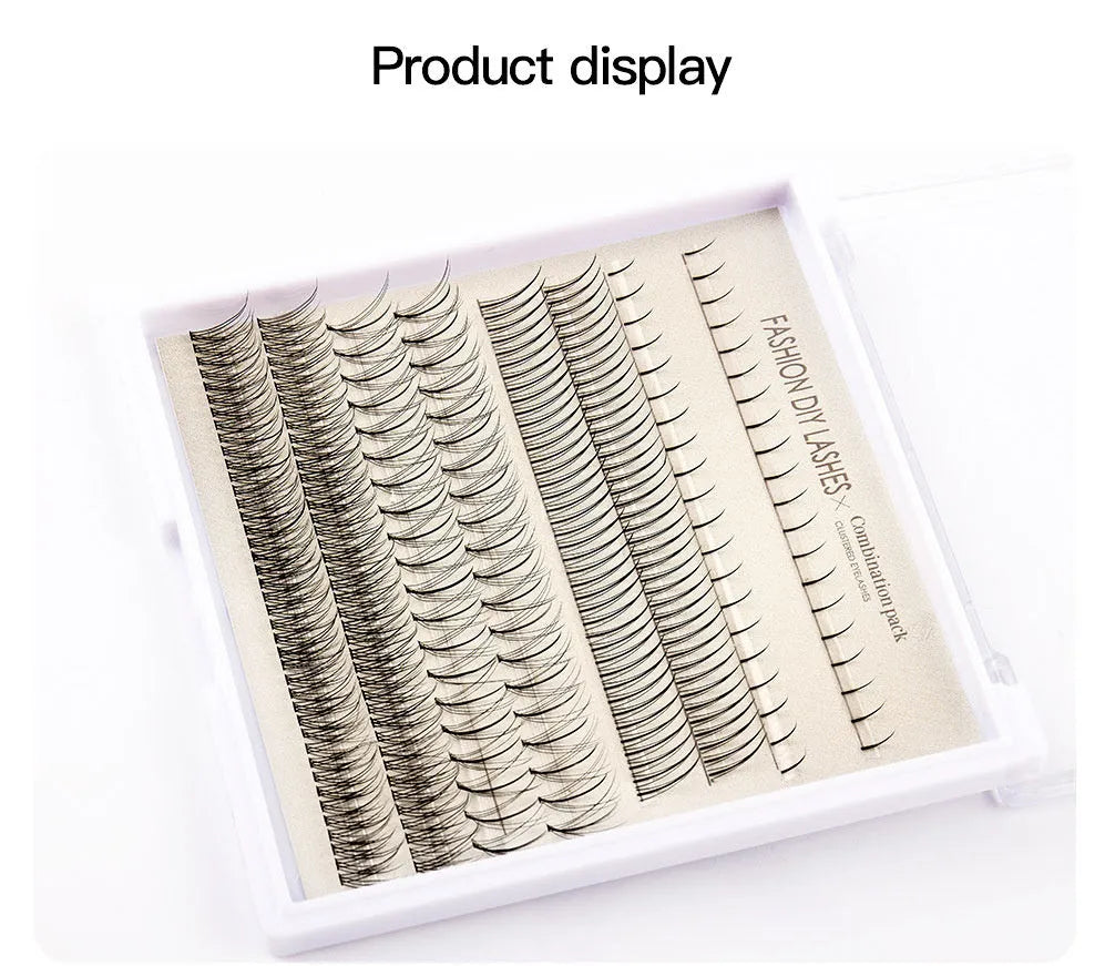 False eyelash kit with natural segmented clusters, adhesive tubes, tweezers and brushes on pink background