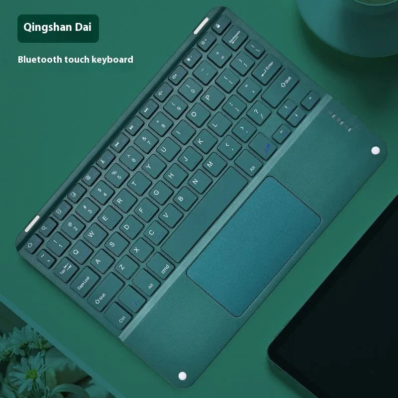 Square Hat touch Bluetooth wireless keyboard in green with wireless charging pad visible.