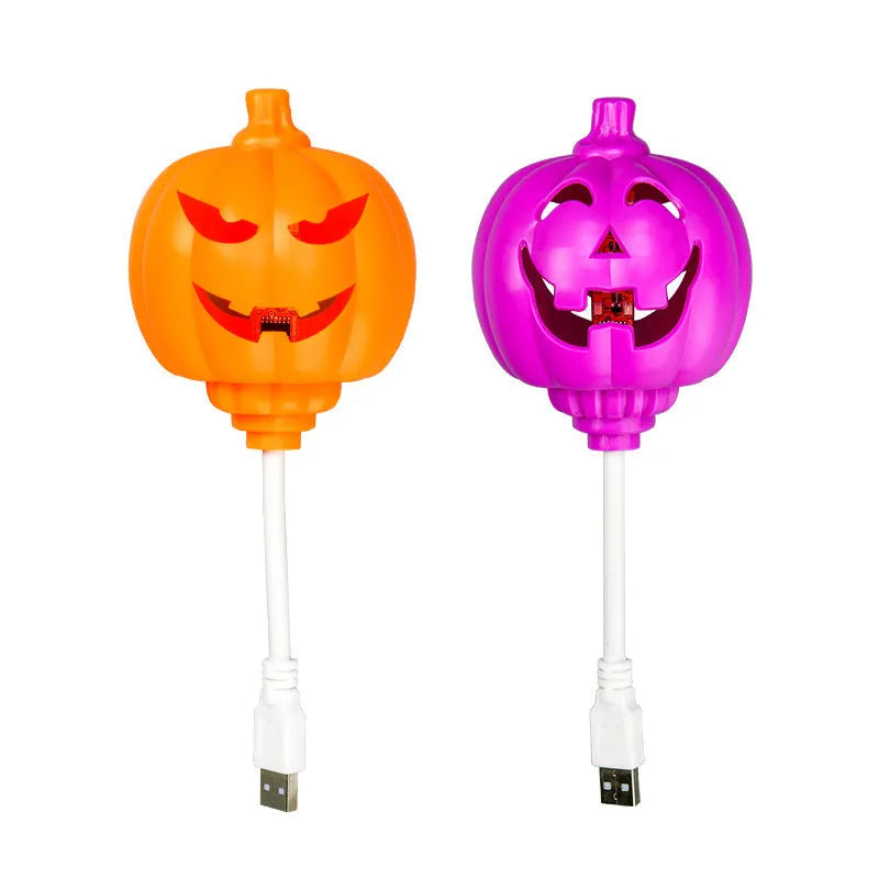 Plastic pumpkin decorative lamp with USB charging port and yellow or purple light options