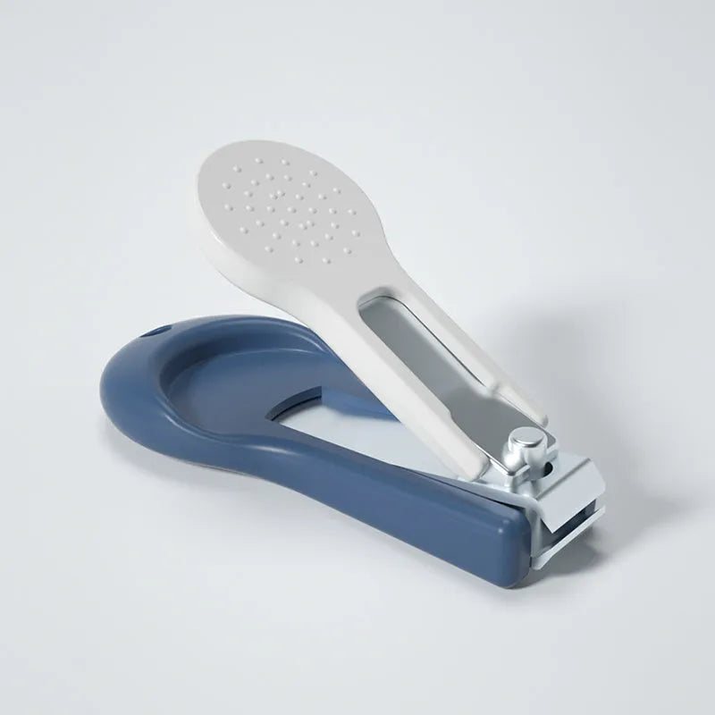 Baby nail clippers set for newborns with silicone finger caps, in colourful animal designs including a blue monkey.