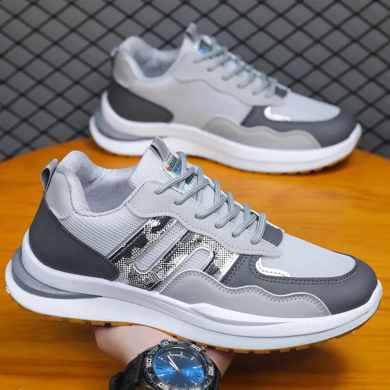 Men's mesh casual sports shoes in white green, black, and grey colours with shallow cut design