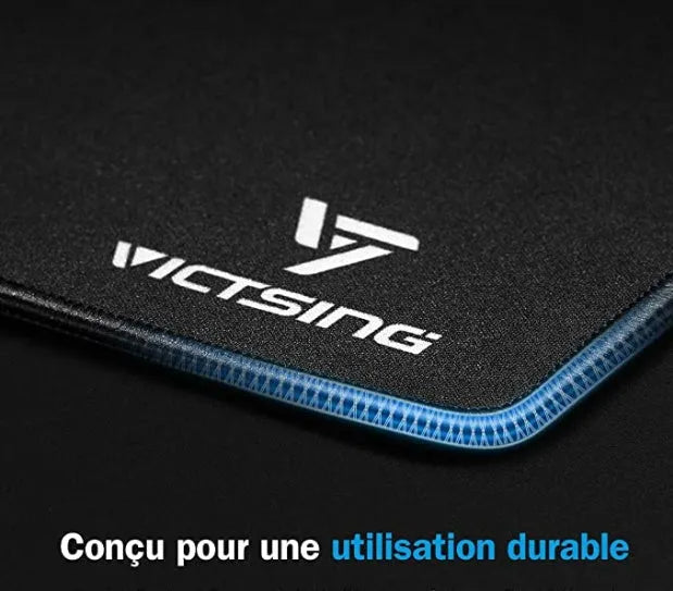 Black thickened rubber gaming mouse pad with rough grain texture, shown with a mouse on its 270mm x 220mm surface.