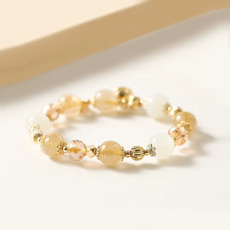 Gold rutilated quartz bracelet with electroplated finish and lucky fortune colour crystals in Korean style design