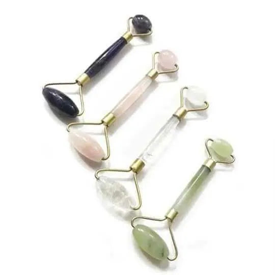 Jade roller massager with rose quartz gua sha stone, dual-sided natural jade facial tool for tension relief and skincare absorption.