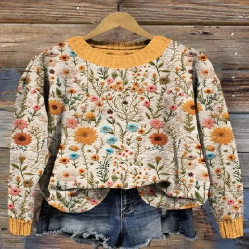 Digital printed floral pattern on a grey round neck sweater, showing the front view.