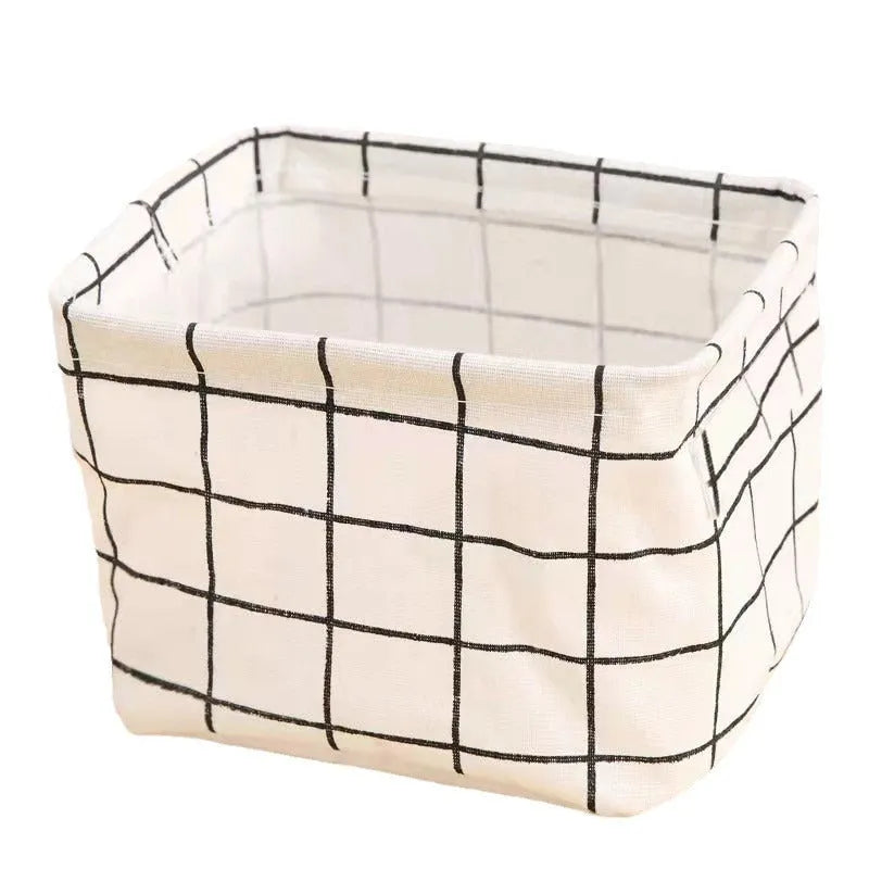 Foldable Oxford cloth desktop storage basket, 20x14x16cm, shown in a patterned pastoral style.