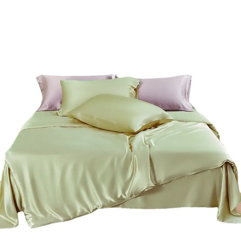 Silk duvet cover in a solid colour, shown in one of six colour options including Lotus Pink and Silver Blue.