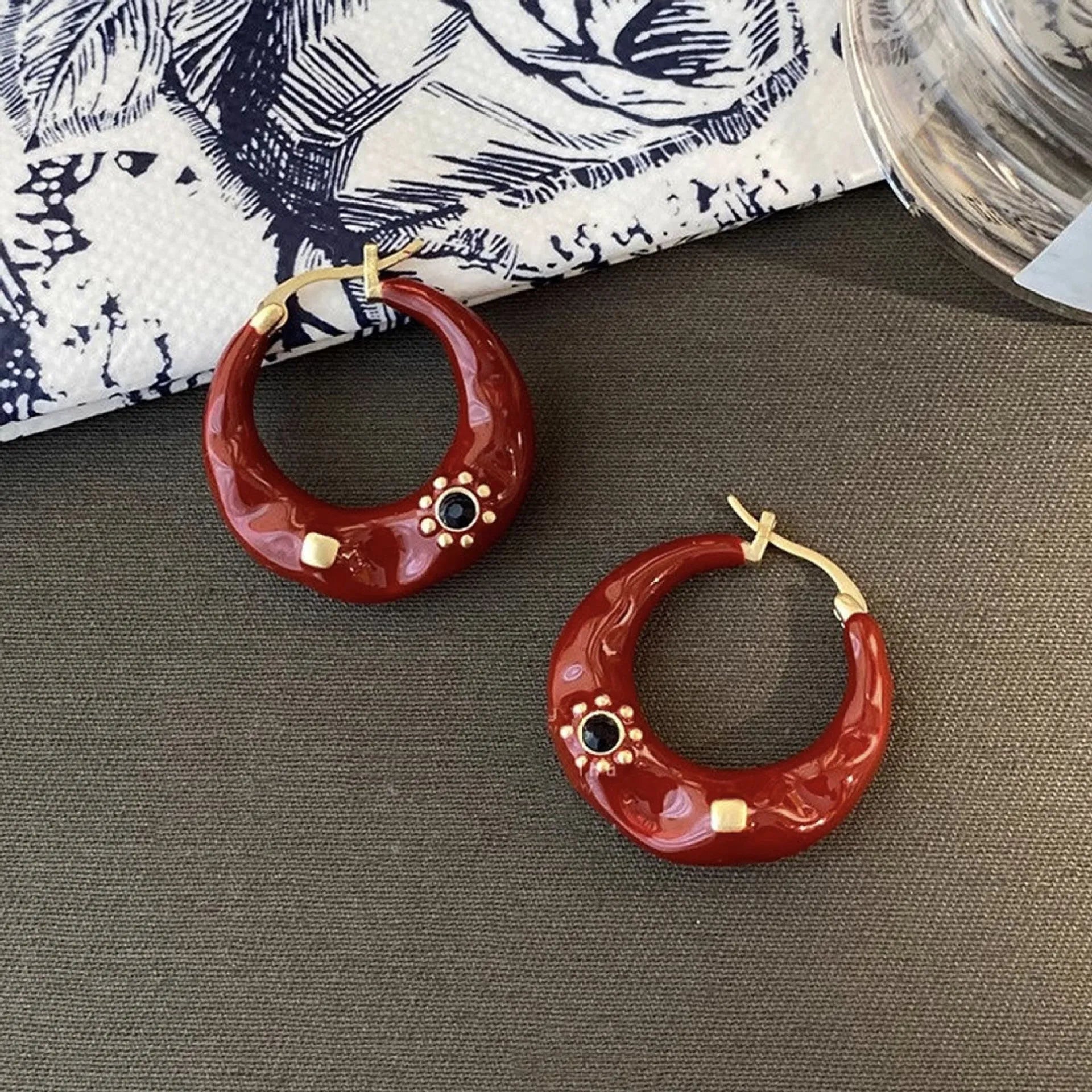 Hong Kong style retro ear studs with rhinestone inlay in black and red colour options