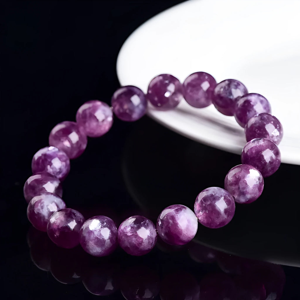 Purple Grandmother Crystal geometric bracelet with polished beads.