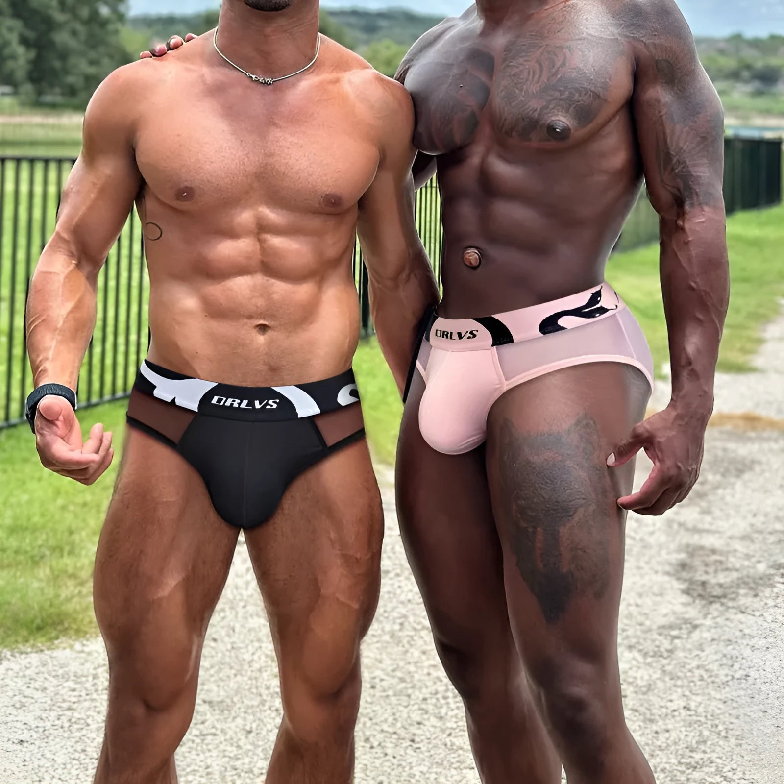 Men's solid colour modal boxer shorts showing low waist design in black, pink, and red options