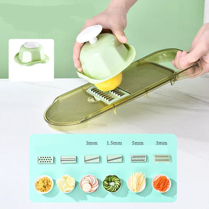 Multifunctional vegetable chopper with interchangeable stainless steel blades, water filtration port, and transparent body