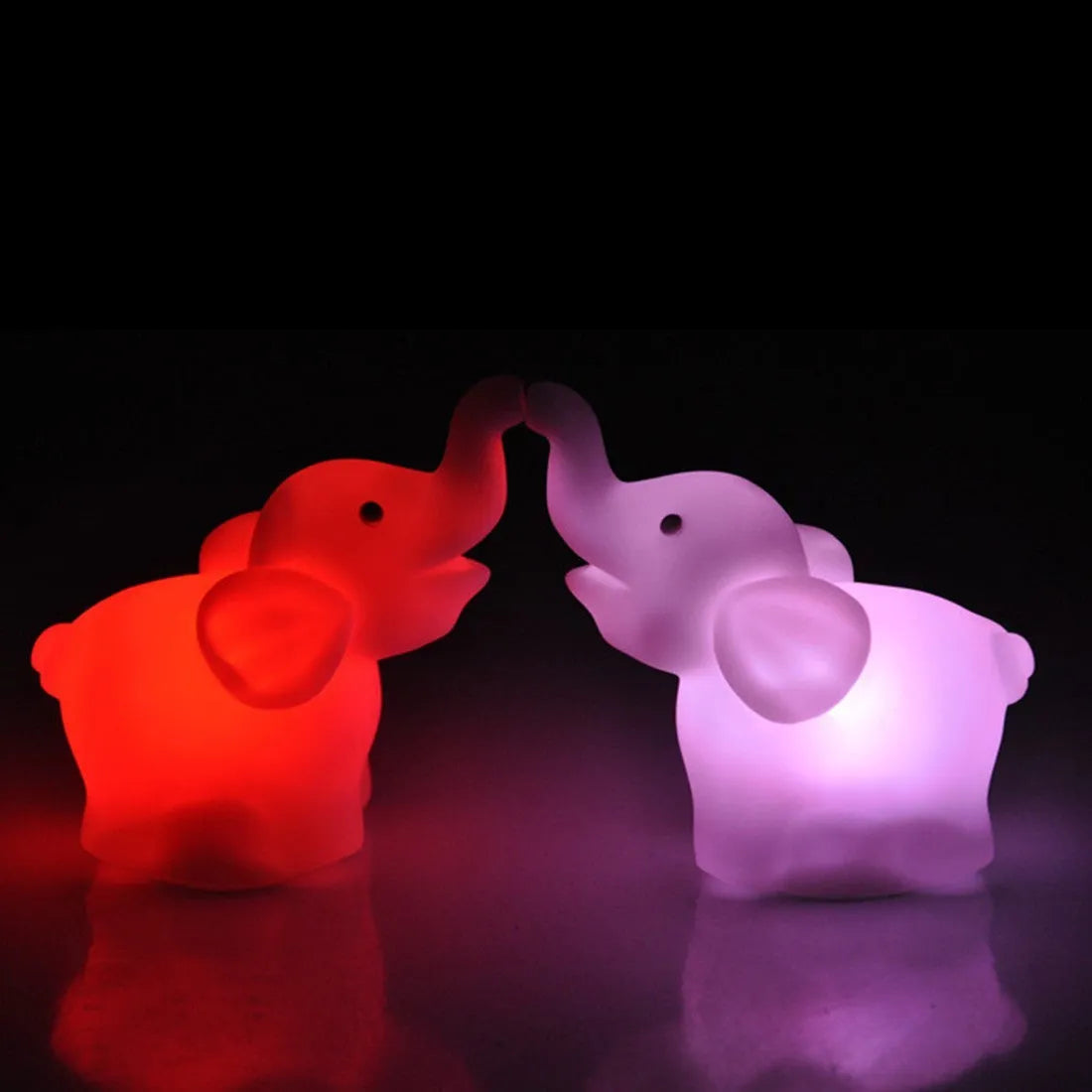 Elephant night light, vinyl, 8x8.8x4.5cm, battery operated, 7 colour slow flashing lamp