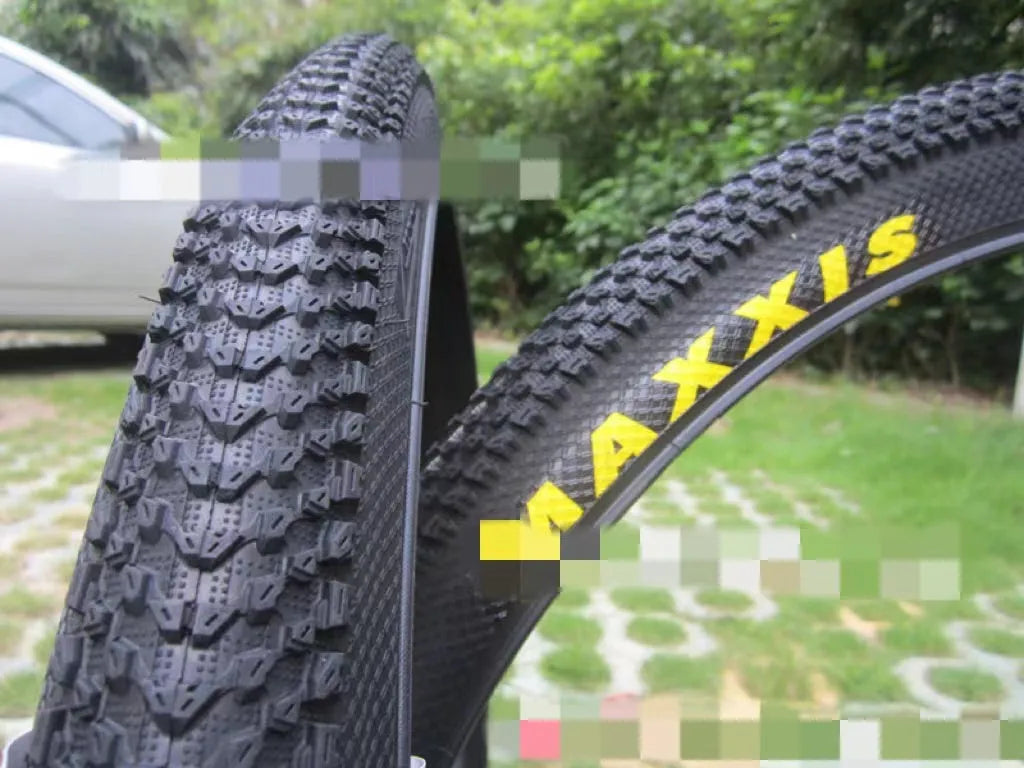 Ultralight puncture-proof mountain bike tyre shown for 26, 27.5 and 29-inch wheel sizes.
