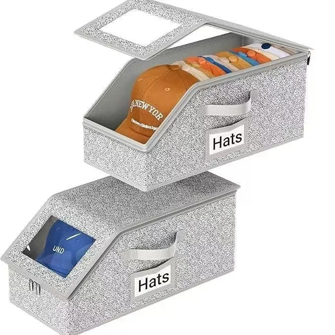Grey foldable woven fabric storage box with lid, shown with dimensions 42cm long by 22cm wide by 17cm high.
