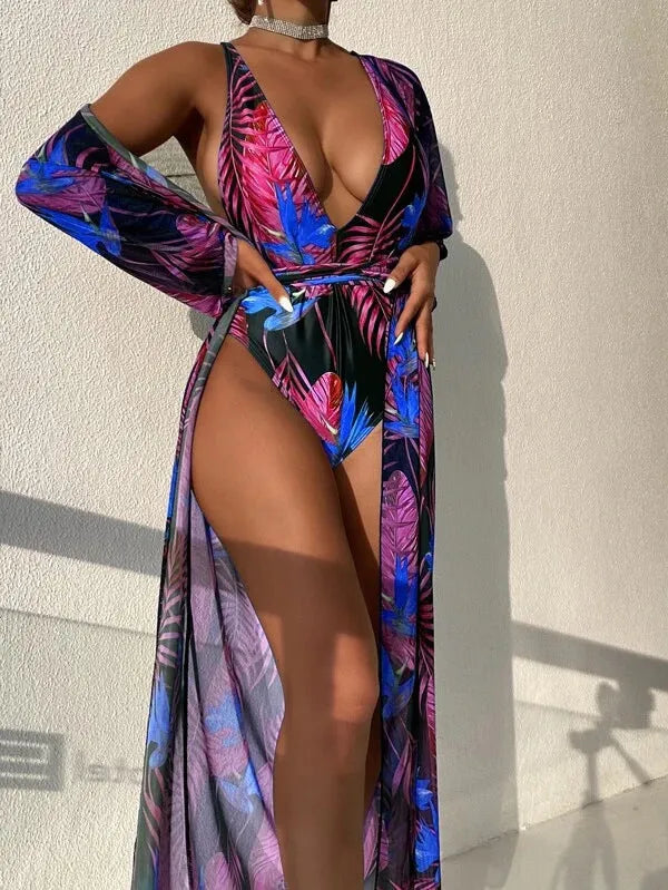 Women's patterned bikini one-piece swimsuit and matching coat set on a mannequin.