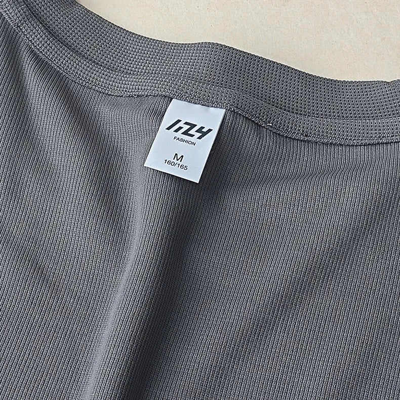 Men's dark grey heavy waffle knit short-sleeved t-shirt on a hanger.