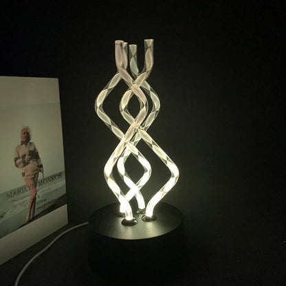 Acrylic table lamp with dancing light display and color-changing modes, perfect for home, office, and party decor