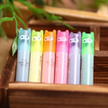 Six plastic highlighter pens with oblique shape and chisel tips in multiple colours for text marking
