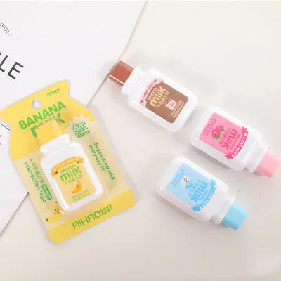 Cute bottle-shaped correction tape dispenser with decorative pattern showing 6m smooth adhesive tape.