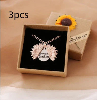 A stunning sunflower pendant necklace with an adjustable chain in various fashionable colors