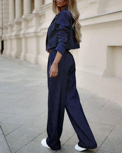 Stylish striped suit set with cropped top and straight-leg pants in various colors