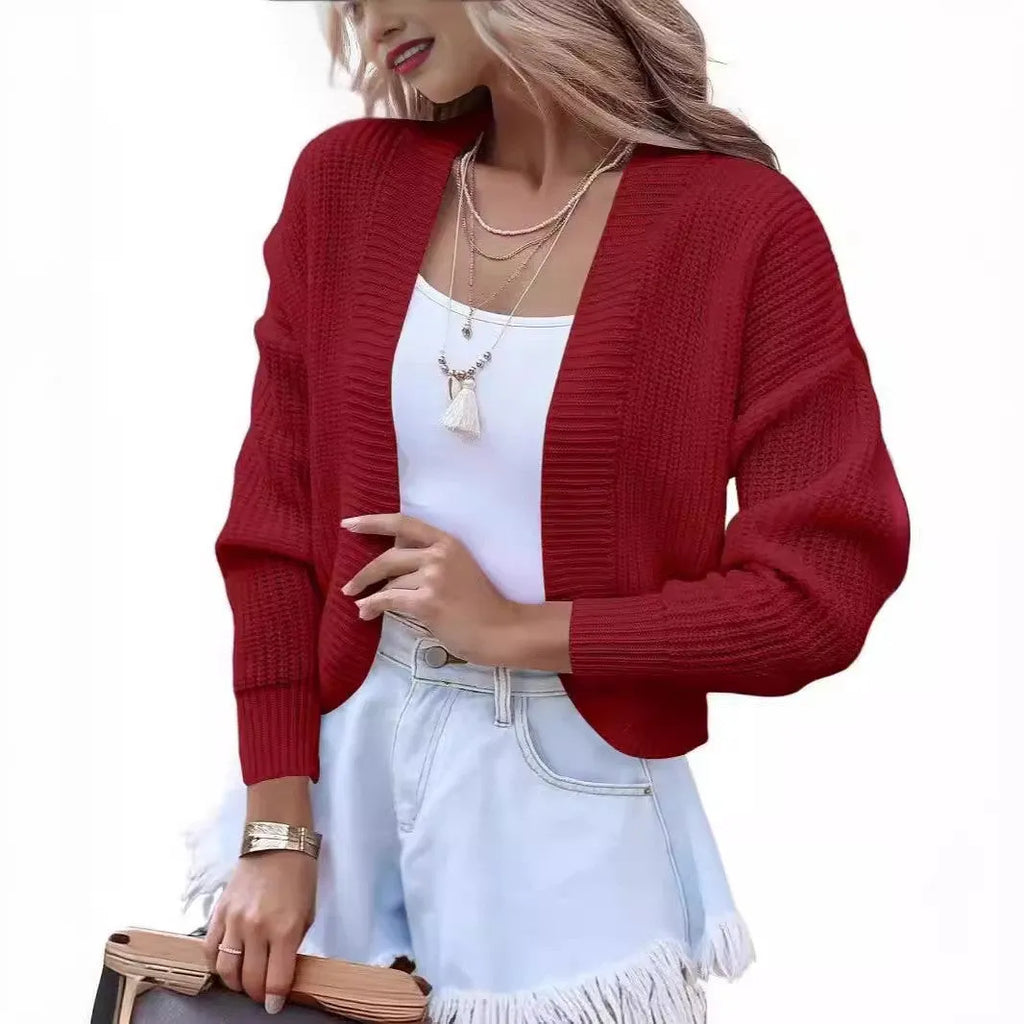Women's solid colour knitted cardigan in camel with long sleeves and open front cape style
