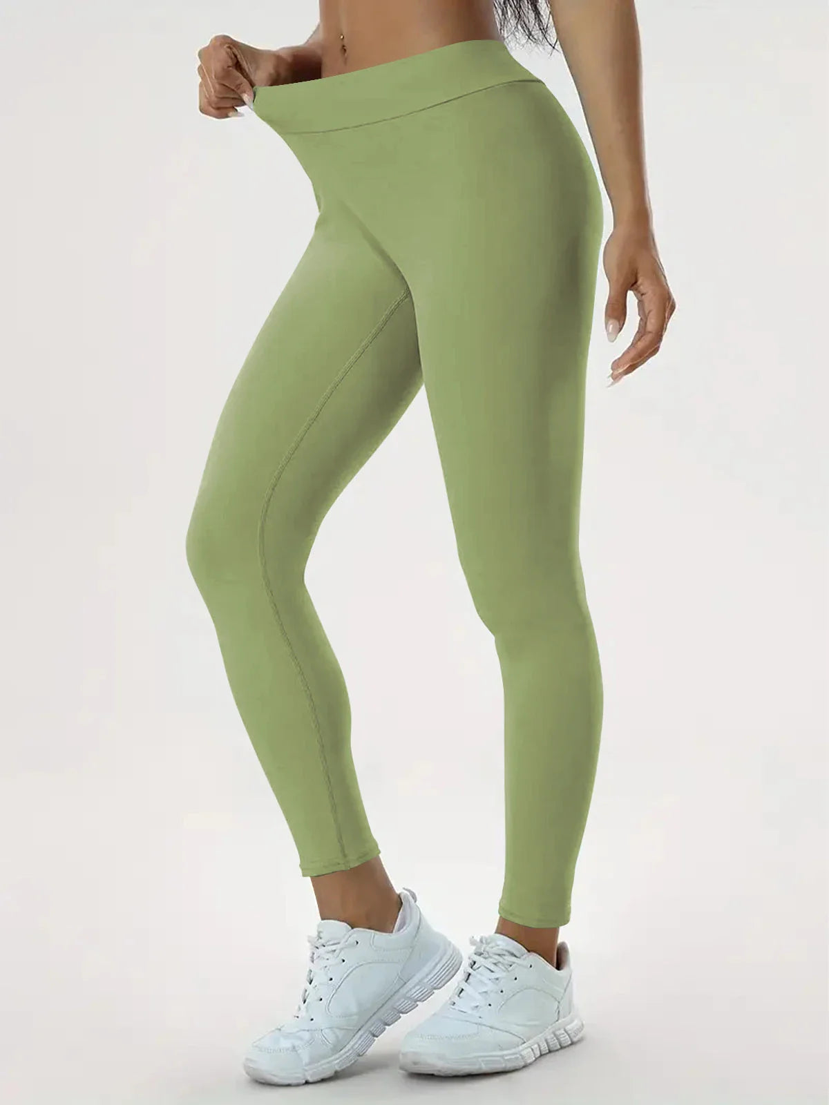 Women's high-waist yoga pants made of premium polyester fabric with a slimming, flattering design