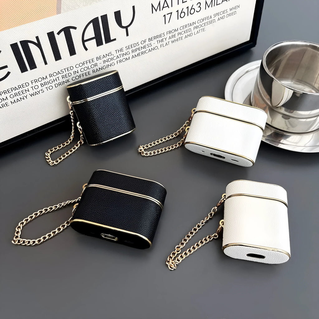 TPU protective cover for AirPods in black with frosted finish and chain attachment.