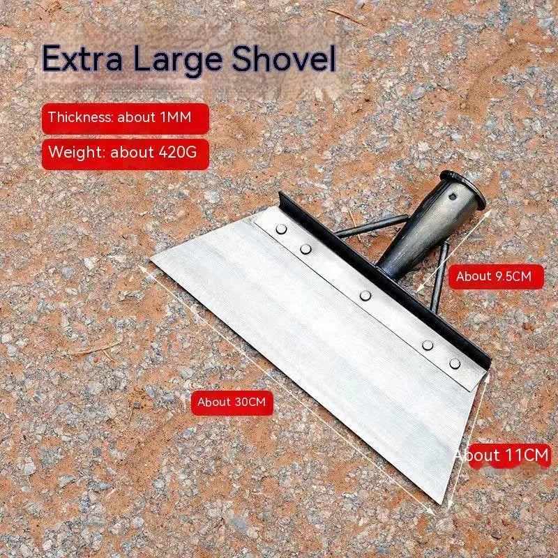 Manganese steel cleaning shovel with a long handle, shown in a garden setting.