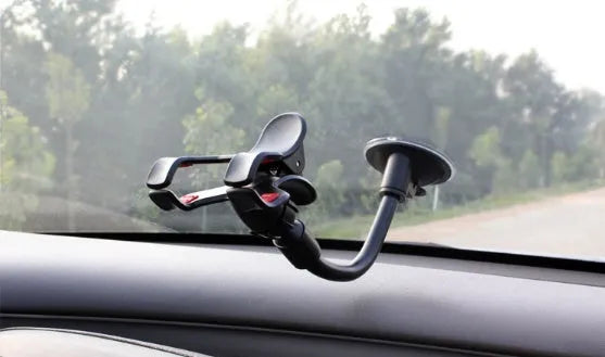 Guitar phone holder stand with suction cups attached to a guitar showing lyrics on phone screen