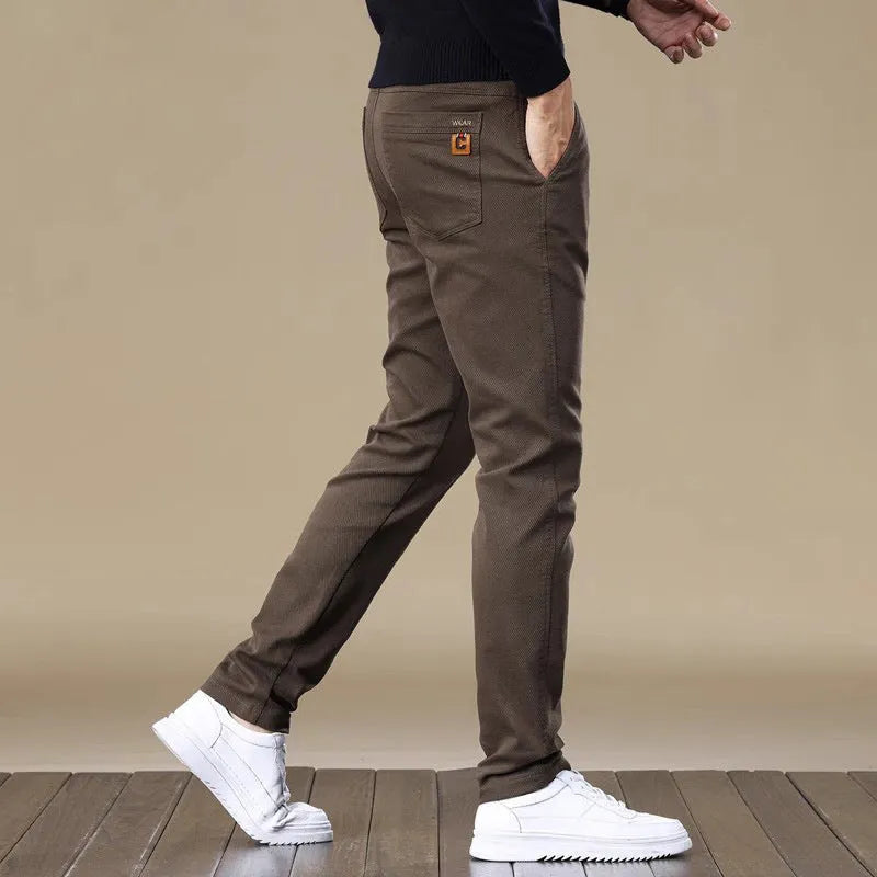 Men's fleece-lined slim fit tapered casual pants in black cotton fabric