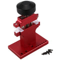 Red metal watch tube machine with 7 pusher punch bits in a stand