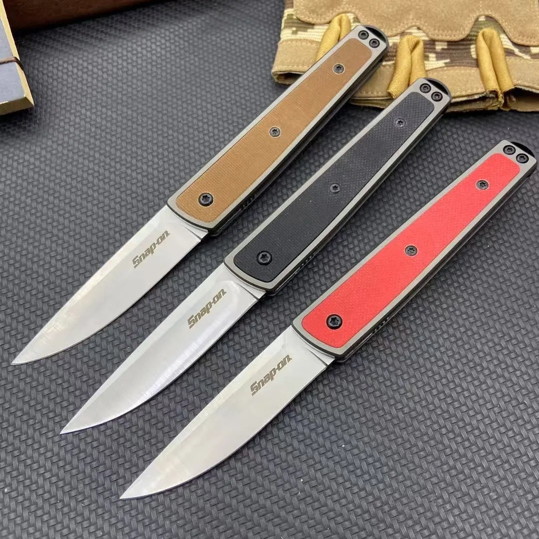 Folding fruit knife with stainless steel blade shown in black, red, and coffee colour variations